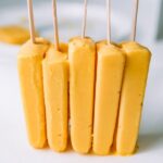 5 Mango Lassi Popsicles stack together