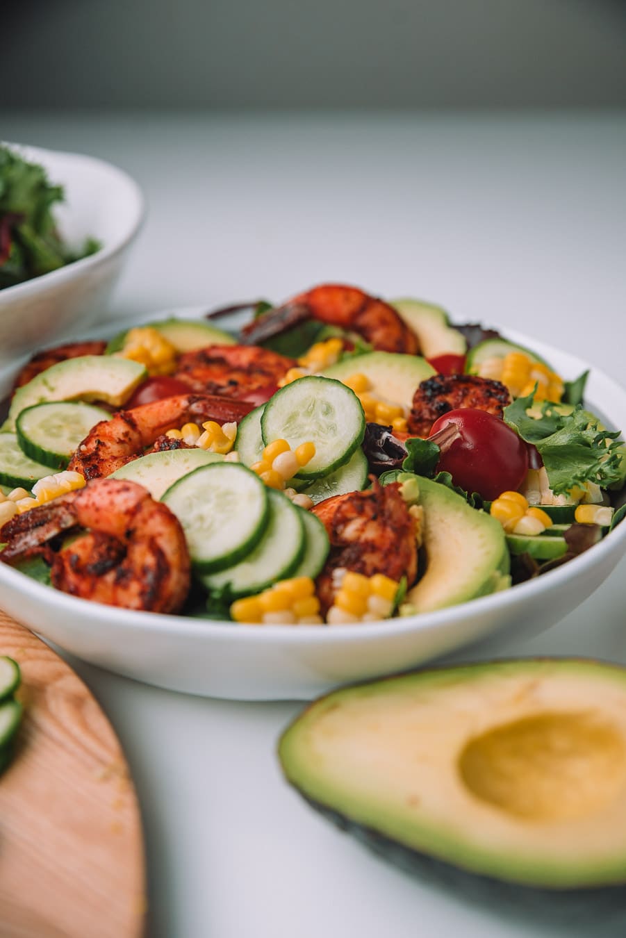 Bowl filled with Blackened Shrimp and Avocado Salad