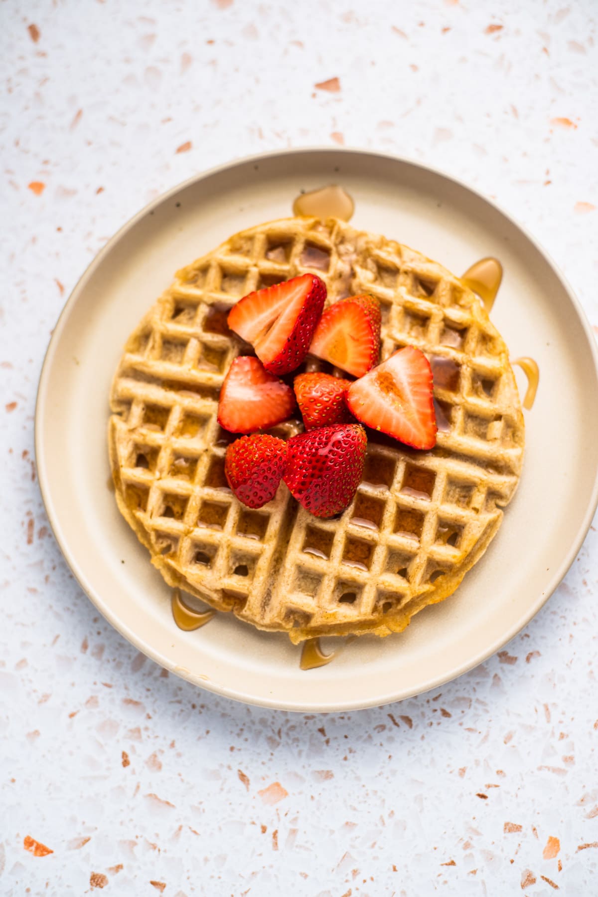 Homemade Waffle Recipes topped with fresh strawberries