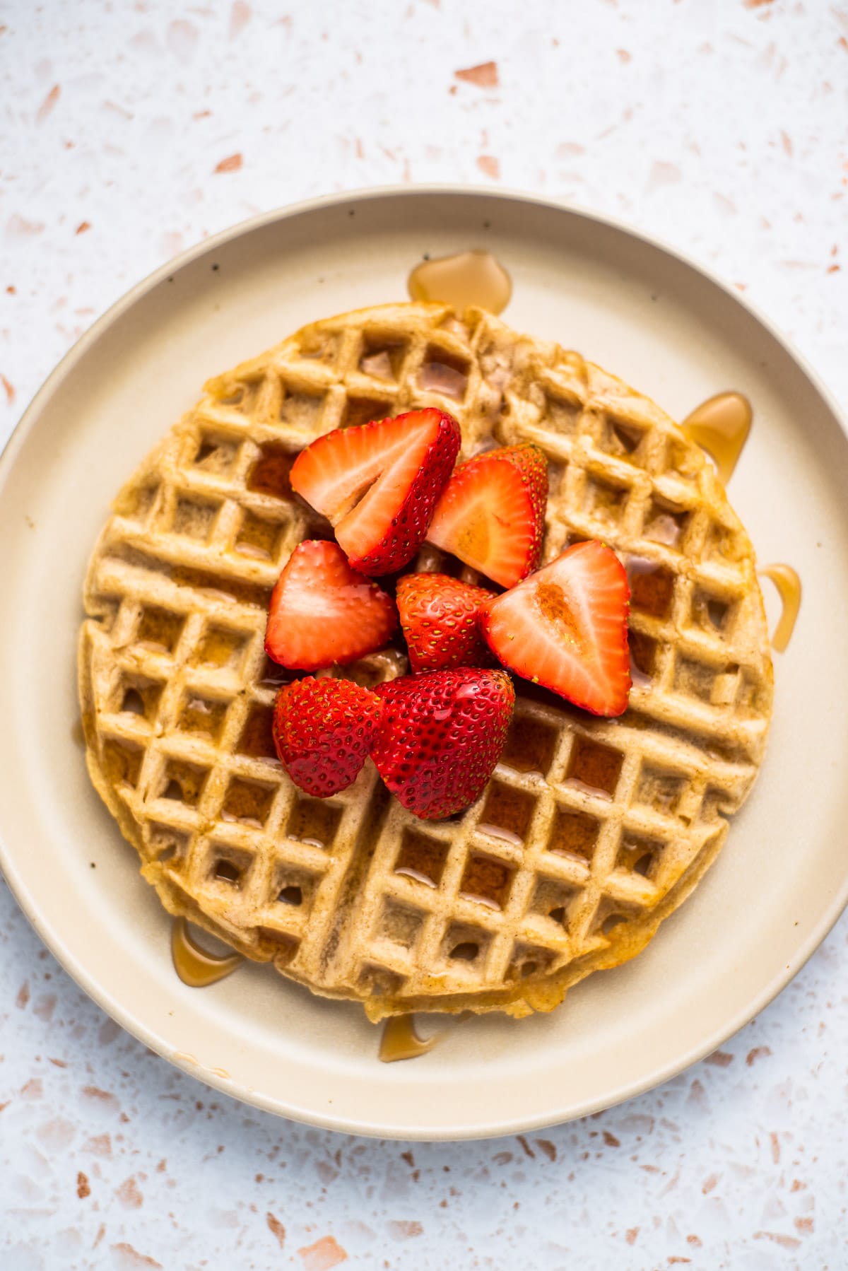 Homemade Waffle Recipes topped with fresh strawberries