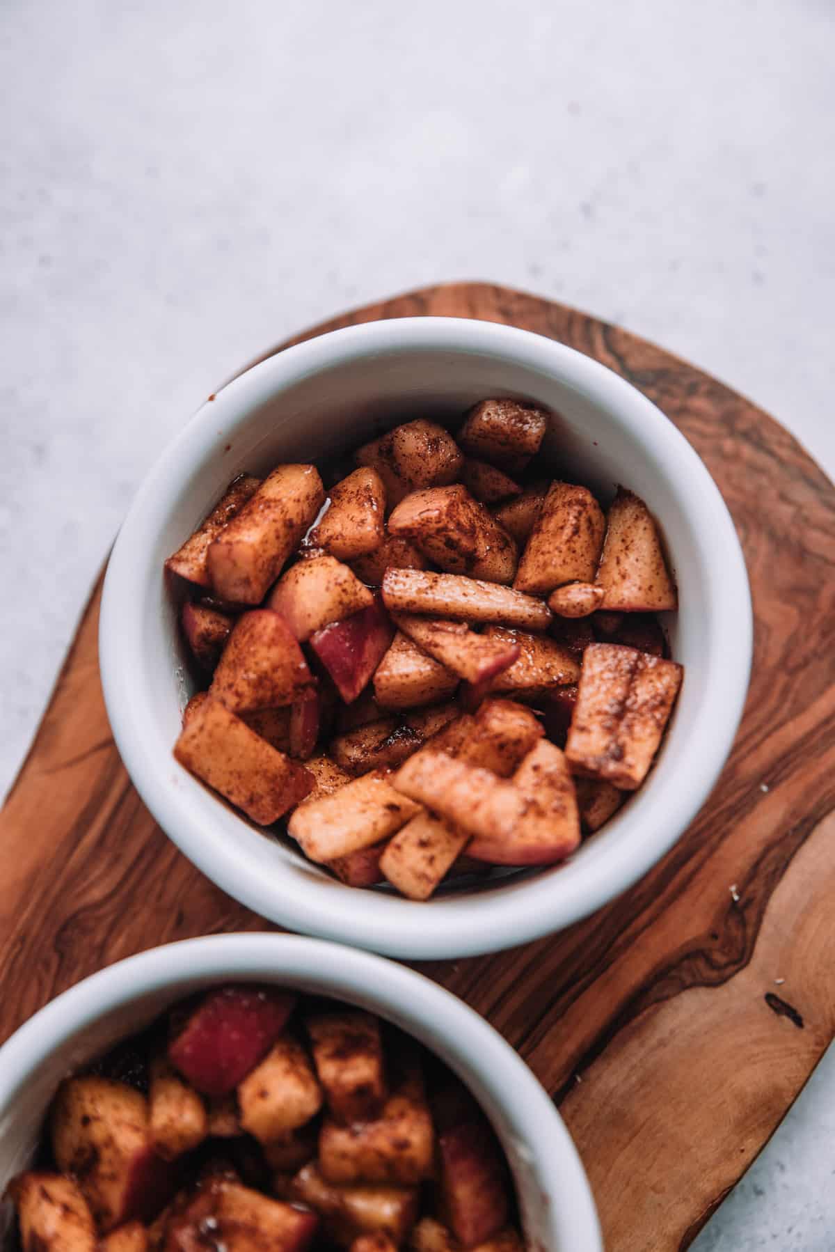 Diced apples in a white ramekin